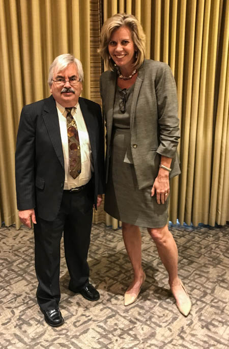 Outgoing National Advisory Board Chair Peter Ewell
            and Center Executive Director Evelyn Waiwaiole